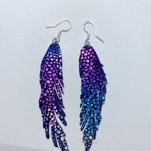 Pretty metallic feather earrings. New